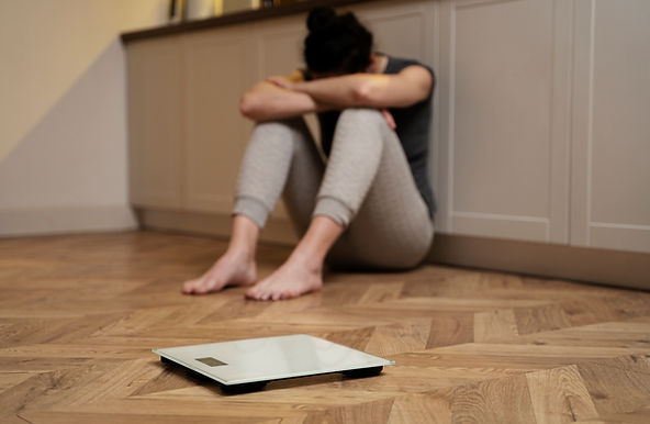 woman-with-eating-disorder-crying-scale.jpg