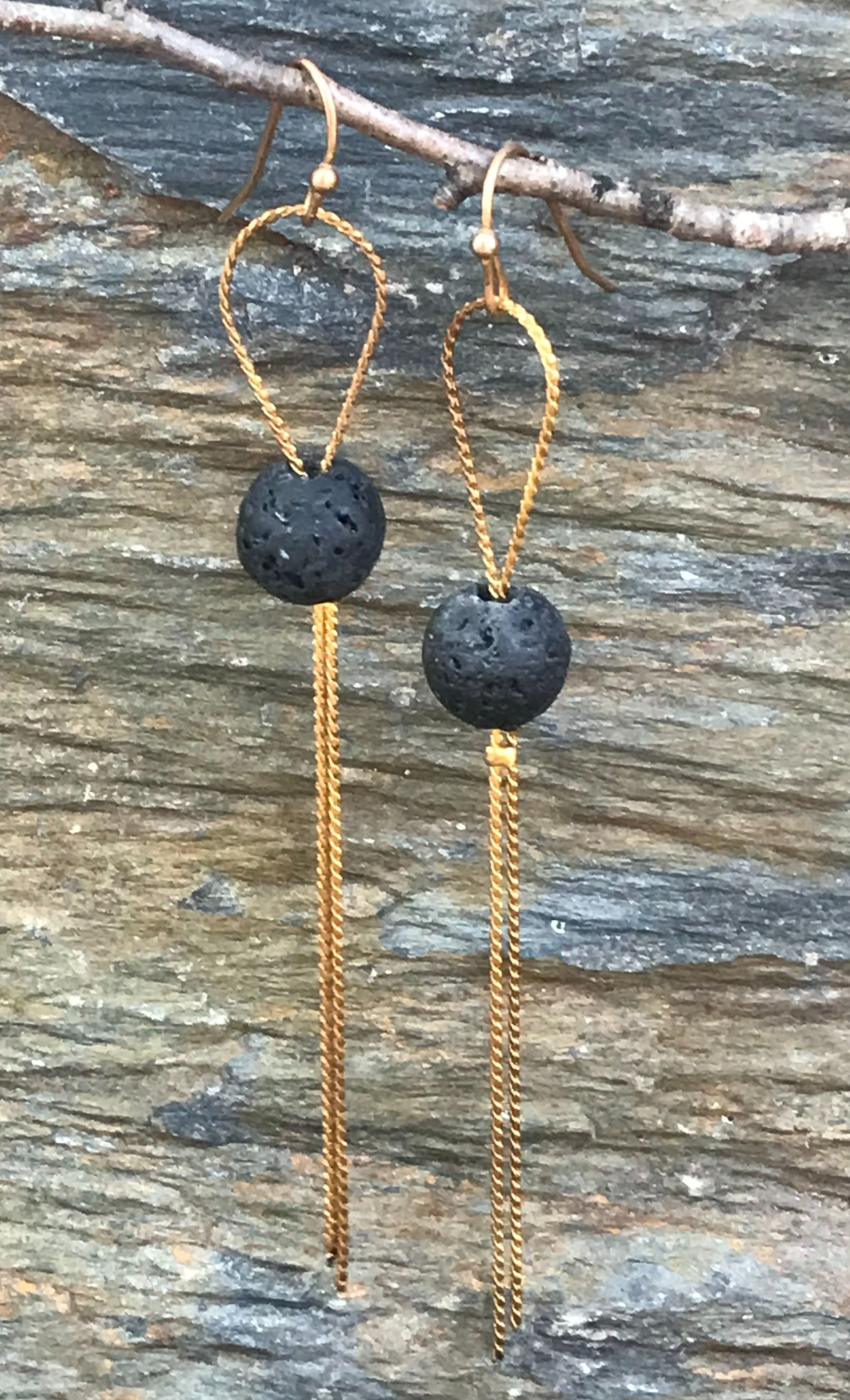 Chain knot of lava spheres earrings