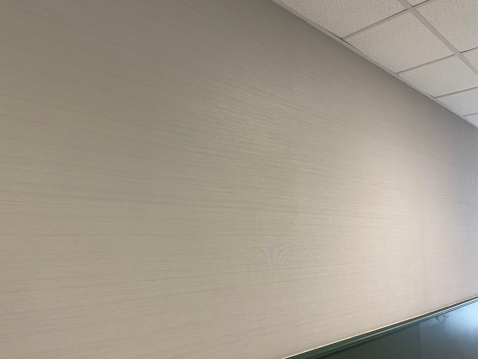 Corridor finish installation in progress in a commercial building in DFW