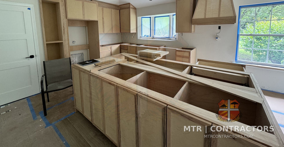 Kitchen cabinet boxes set before countertops — whole-home remodel by MTR Contractors, Frisco TX