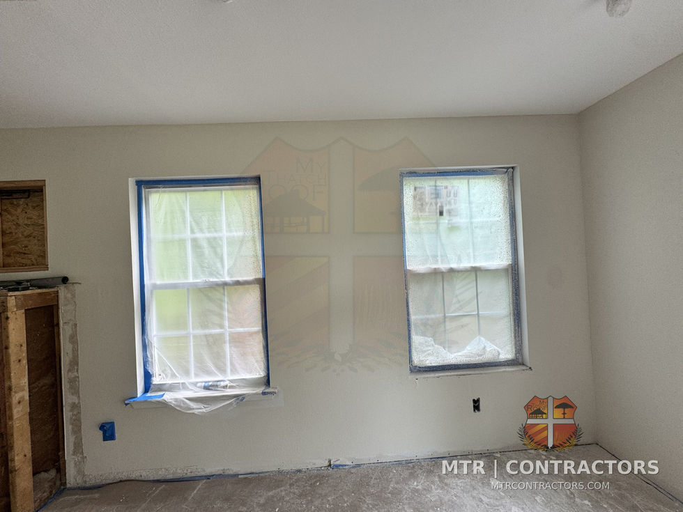 New double windows in the living room addition — whole-home remodel by MTR Contractors, Frisco TX