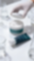 freepik__img1-img2-main-product-placed-center-on-reflective__81704.png