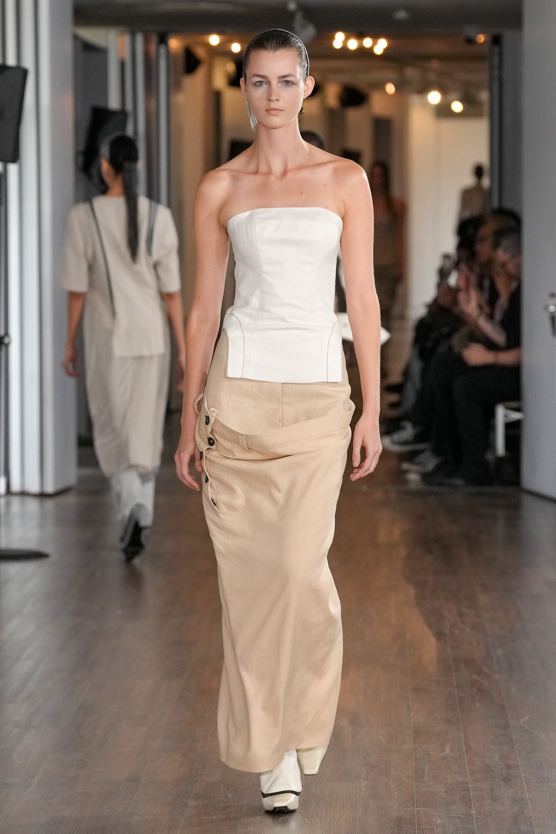 J E Cai Spring Summer 2024 Collection. OXO Tower, London. 17 September 2023. LFW Ready to Wear SS24