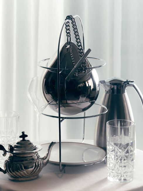 A closer look at that favourite English passtime, Afternoon Tea. Shot by Andrew Rankin at The Four Seasons Tower Bridge. Fashion Editor, Ashley Conor. The Britannia & Éire Issue 5ELEVEN Magazine. Garments from Jimmy Choo, Cartier, Ferragamo, McQueen and Swarovski