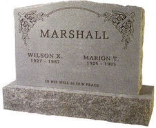 A cemetery monument with Marshall engraved on it