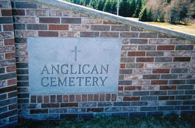 A stone sign for the Anglican Cemetery