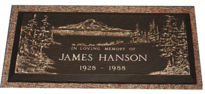 A textured stone slab with James Hanson written on it