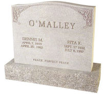 A cemetery monument with O’ Malley written on it