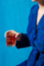 Woman holding a cocktail