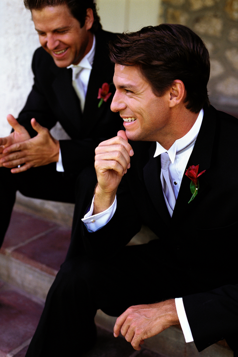 A groomsmen tuxedo is designed to create a polished and cohesive look that complements the groom's attire while allowing for a touch of individuality among the groomsmen. Typically, the tuxedo features classic fabrics such as black or navy, mirroring the groom's ensemble but offering opportunities for customization in shades or styles to align with the wedding theme.