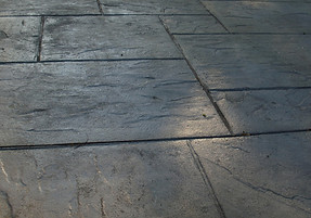 Close-up view of textured and patterned concrete paving stones