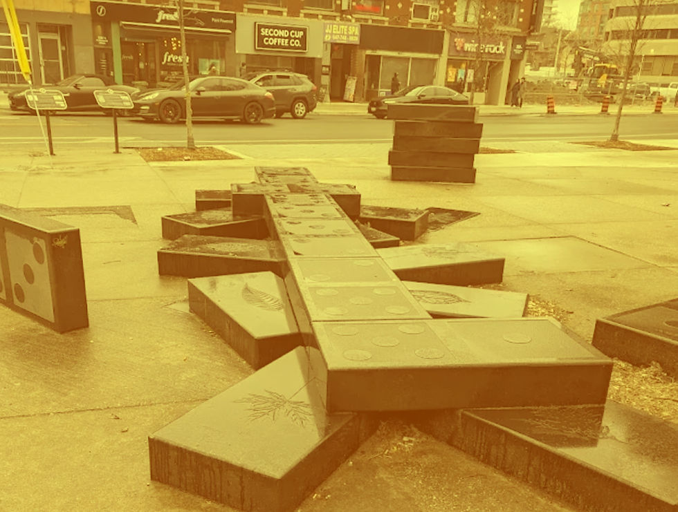 A marble art decoration of large rectangles on the ground at Matt Cohen Park