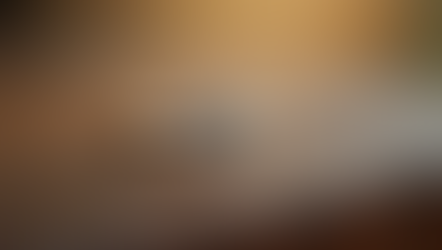 Close-up view of a sparkling eco-friendly diamond ring on a wooden surface