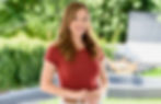 Sacramento real estate photographer Ashley Blackmer Personal Branding Photography smiling outdoors with modern backyard in ba