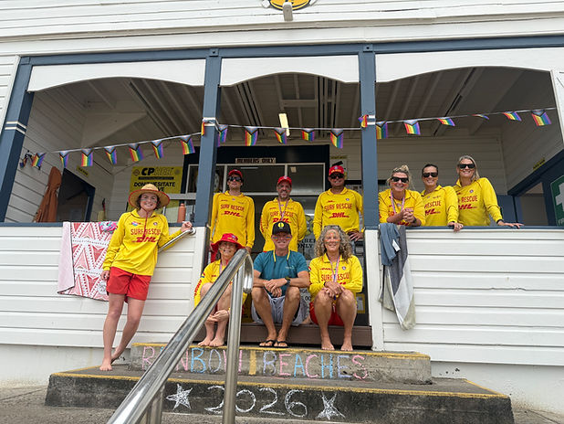 Yamba Patrol Members on Surf Club Stairs celebrating Rainbow Beaches Day 2026