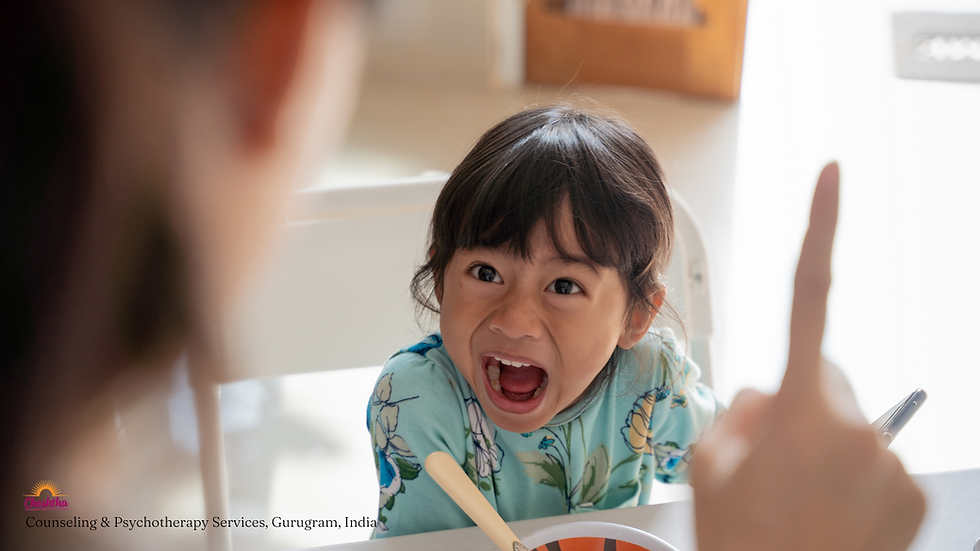 Angry child yelling at a parent, mid-meal — a visual example of emotional dysregulation in young children