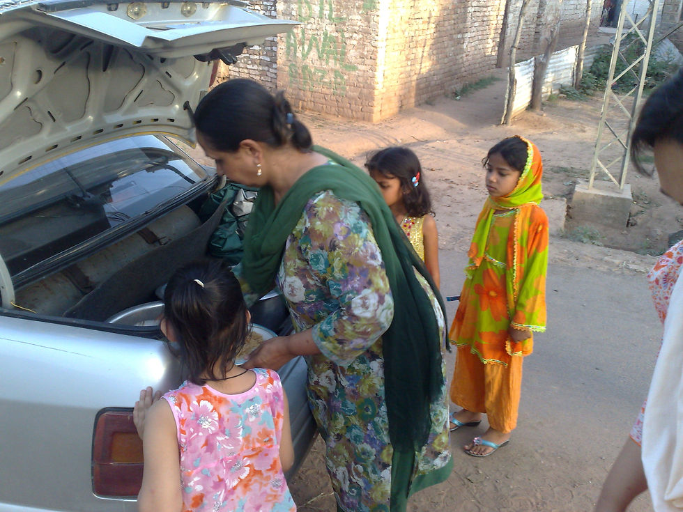 President Dr. Sultana distributing cooked rice
