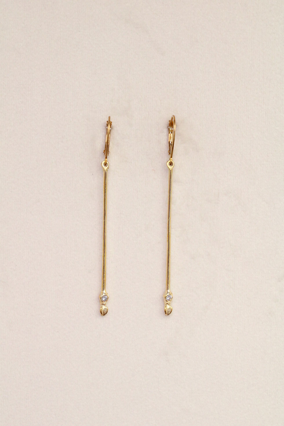 Pendientes largos de diamante con movimiento