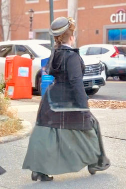 Actress Lillee Jean Trueman on set The Gilded Age Season 3, Train Station Scene | Screen Capture
