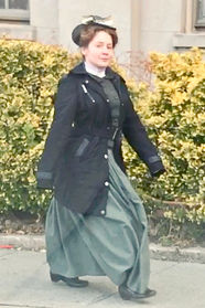 Actress Lillee Jean Trueman on set The Gilded Age Season 3, Train Station Scene | Screen Capture