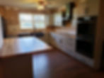 Floors down cabinets up making progress