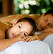 An attractive young couple lying on mass