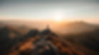 Man standing on top of mountain