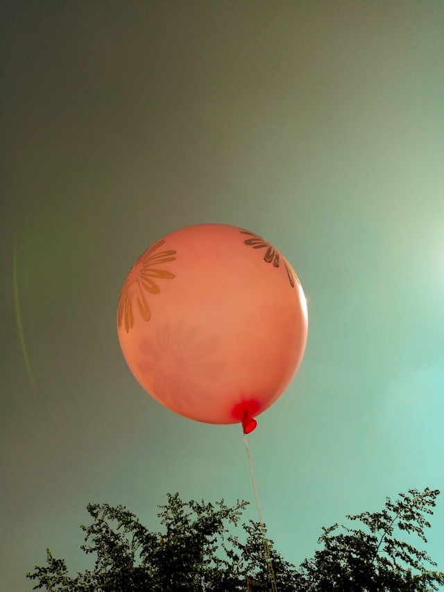 a ballon floating in the air