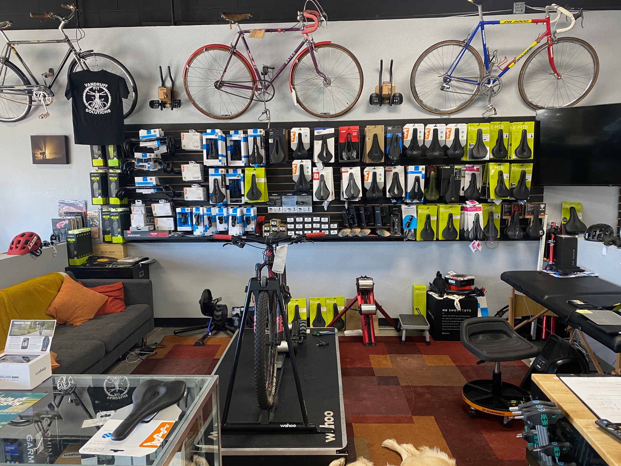 The bike fitting studio with a trainer and saddle selection