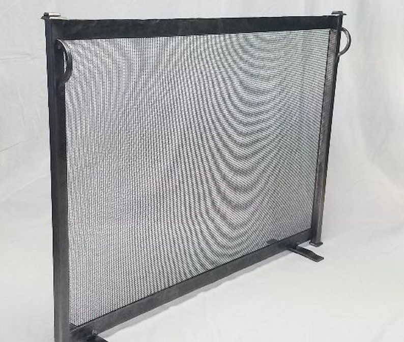 Thumbnail: Forged iron fireplace screen