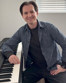 Nicholas Bridgman at piano, straight on.jpg