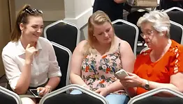 Avon jackie talking to two interested people