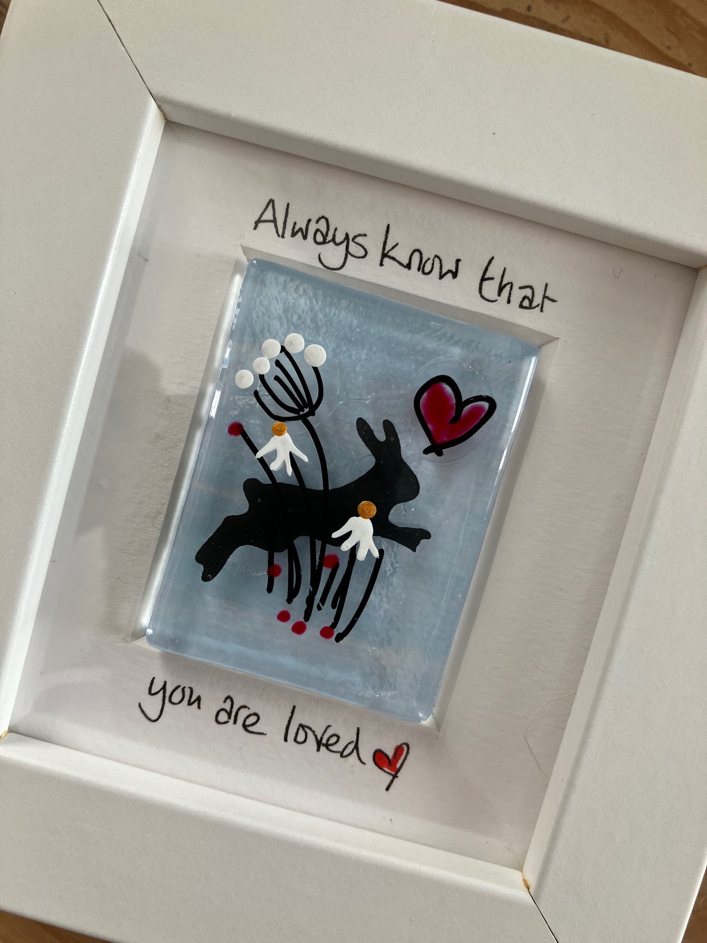 Small white frame with fused glass hare 