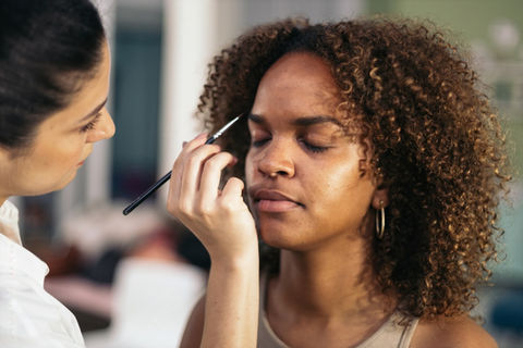 The process of making something lighter in color. In the context of beauty, lightening can refer to the process of lightening the skin or hair.