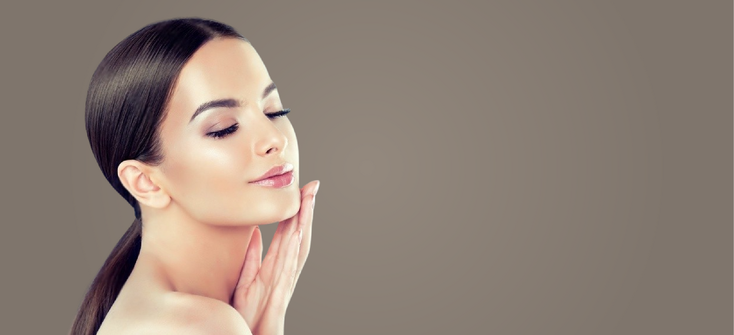 A photo of a woman getting a facial at a salon that offers a variety of facial services, including cleansing, exfoliating, and moisturizing.