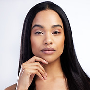 beautiful mix race woman with her hand under her chin