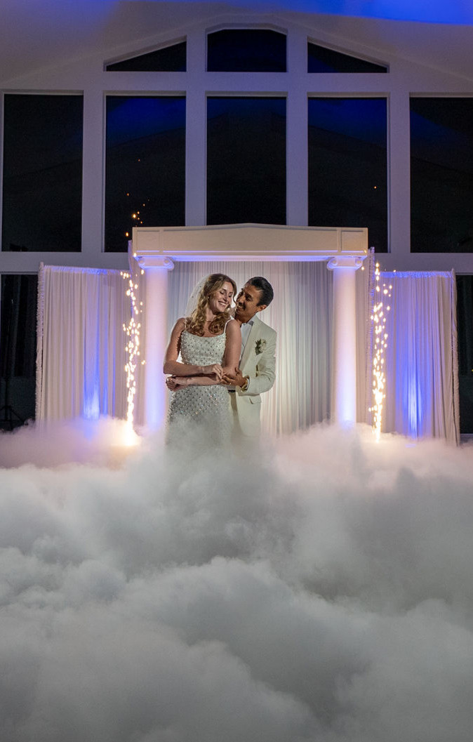 newlyweds dancing with fog machine and cold sparks_edited.jpg