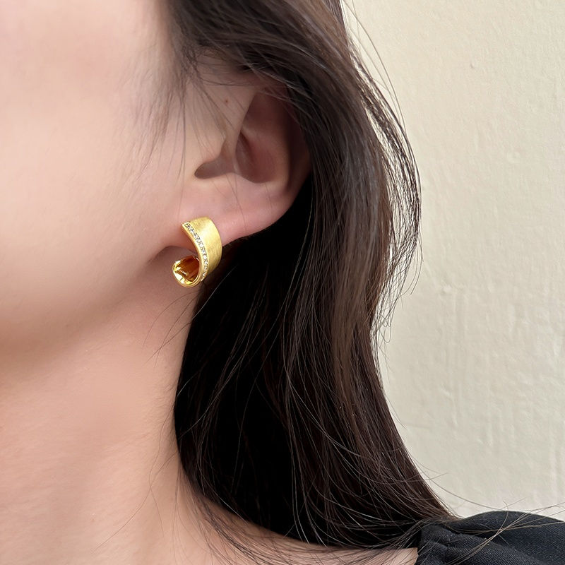 Thumbnail: Korean new fashion jewelry 14K gold plated brushed twisted metal zircon earrings