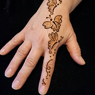 henna tattoo of 3 butterflies on the back of the hand.s.png