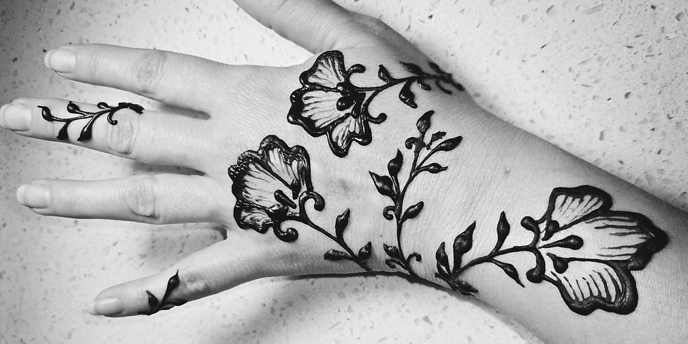 Arabic floral henna design tattoo on back of hand in Gilbert, Arizona__edited_edited.jpg