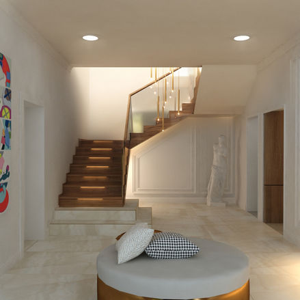 Entrance hallway with staircase and high ceiling