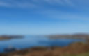 Looking across Loch Ewe with Isle of Ewe on the left and the village of Aultbea on the right
