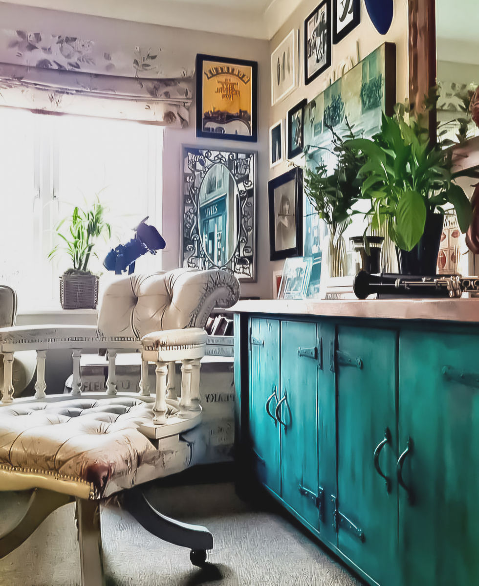 eclectic rustic green sideboard and gallery wall