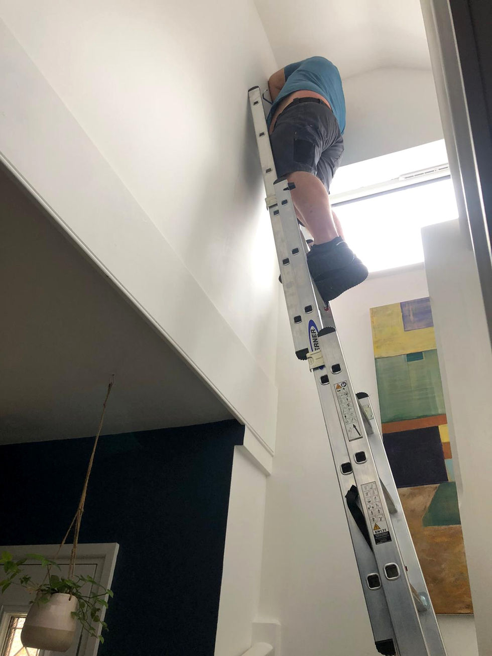 very high up a ladder