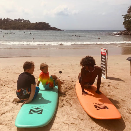 Surf’s Up for Families:  Why Hiriketiya Beach is Perfect for Surfing with Kids