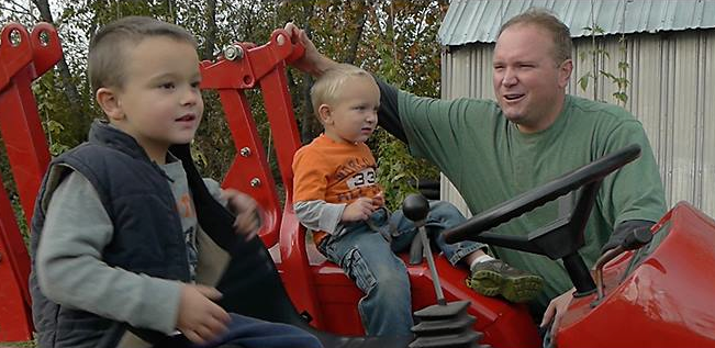Justin Arthur of Cone Keepers and his sons on the farm