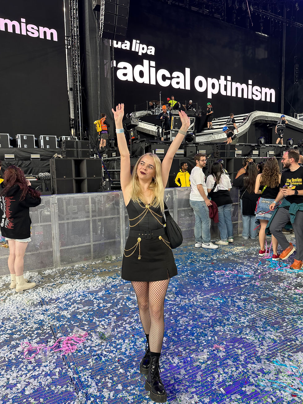 Woman wearing a DIY Dua Lipa-inspired outfit after the concert