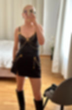 Mirror selfie showing the final fitting of a DIY Dua Lipa-inspired concert outfit, ready for the show.