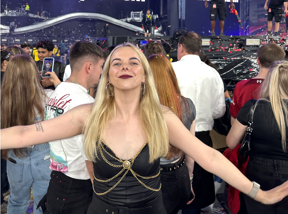 Woman wearing a DIY Dua Lipa-inspired outfit after the concert
