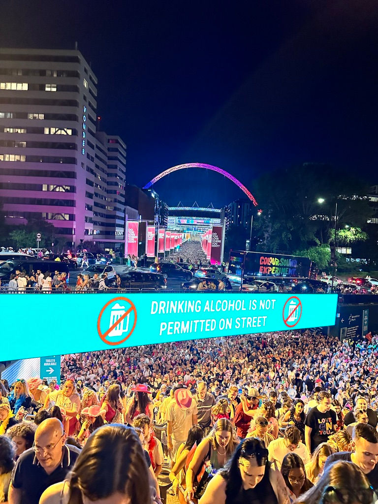 Crowds leaving Wembley Stadium via Olympic Way after Harry Styles concert in 2023